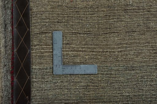 Close-up detail of 2000s Persian Gabbeh rug from Iran / Persia showing Wool weave