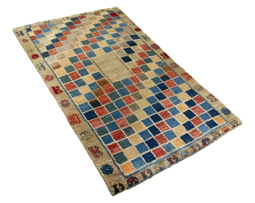 Close-up detail of 2000s Persian Gabbeh rug from Iran / Persia showing Wool weave