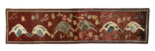 Full view of 2000s Persian Gabbeh rug from Iran / Persia, 323 × 83 cm in Red tones