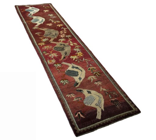 Close-up detail of 2000s Persian Gabbeh rug from Iran / Persia showing Wool weave