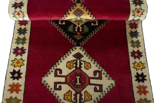 Full view of 2000s Persian Gabbeh rug from Iran / Persia, 181 × 71 cm in Red tones