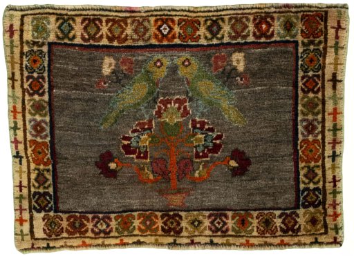 Full view of 2000s Persian Gabbeh rug from Iran / Persia, 44 × 62 cm in Red tones
