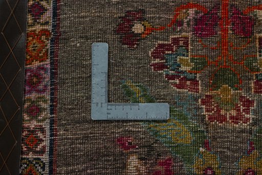 Backside of handmade 2000s Persian Gabbeh rug showing knot structure and weave density