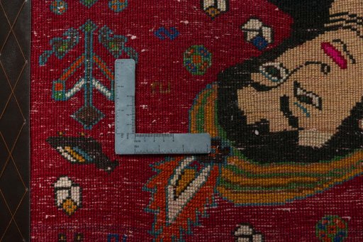 Backside of handmade 2000s Persian Gabbeh rug showing knot structure and weave density