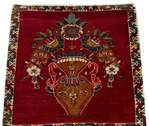 Surface texture of 2000s Persian Gabbeh rug with natural Wool and intricate pattern