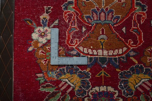 Backside of handmade 2000s Persian Gabbeh rug showing knot structure and weave density