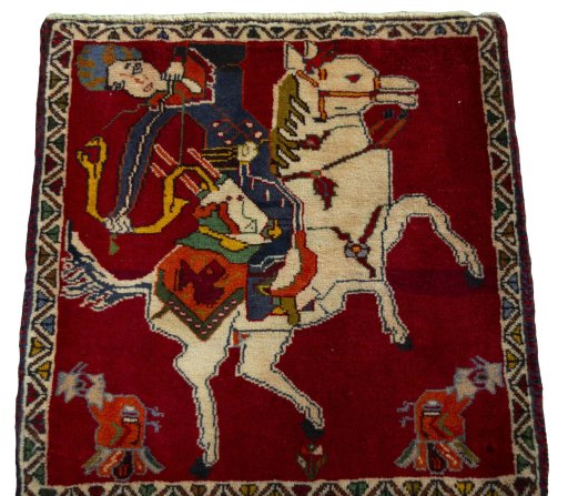 Surface texture of 2000s Persian Gabbeh rug with natural Wool and intricate pattern