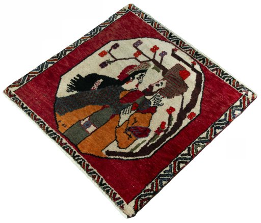 Corner detail of 2000s Persian Gabbeh rug showing border pattern and Wool pile
