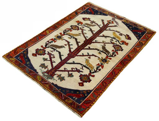 Corner detail of 2000s Persian Gabbeh rug showing border pattern and Wool pile