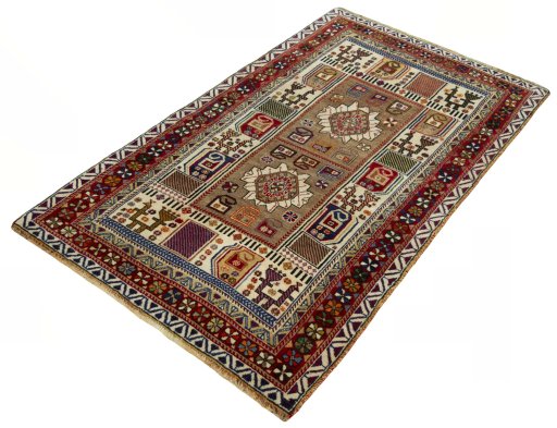 Corner detail of 2000s Persian Gabbeh rug showing border pattern and Wool pile