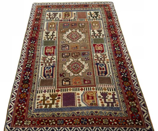 Surface texture of 2000s Persian Gabbeh rug with natural Wool and intricate pattern