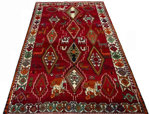 Surface texture of 2000s Persian Gabbeh rug with natural Wool and intricate pattern