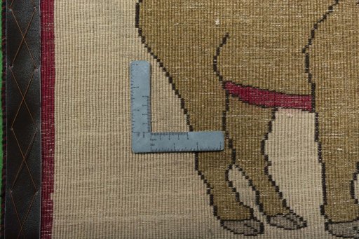 Corner detail of 2000s Persian Gabbeh rug showing border pattern and Wool pile