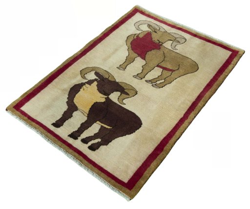 Corner detail of 2000s Persian Gabbeh rug showing border pattern and Wool pile
