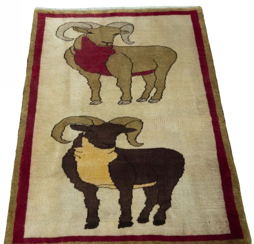 Surface texture of 2000s Persian Gabbeh rug with natural Wool and intricate pattern