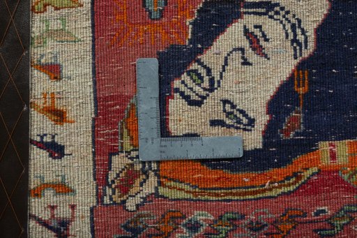 Backside of handmade 2000s Persian Gabbeh rug showing knot structure and weave density
