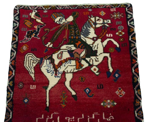 Surface texture of 2000s Persian Gabbeh rug with natural Wool and intricate pattern