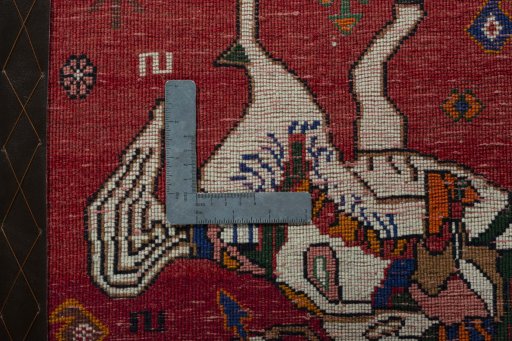 Backside of handmade 2000s Persian Gabbeh rug showing knot structure and weave density