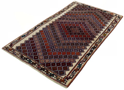 Corner detail of 2000s Persian Gabbeh rug showing border pattern and Wool pile
