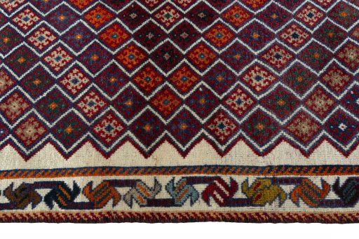 Close-up detail of 2000s Persian Gabbeh rug from Iran / Persia showing Wool weave