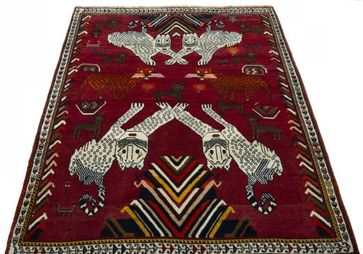 Surface texture of 1970s Persian Gabbeh rug with natural Wool and intricate pattern