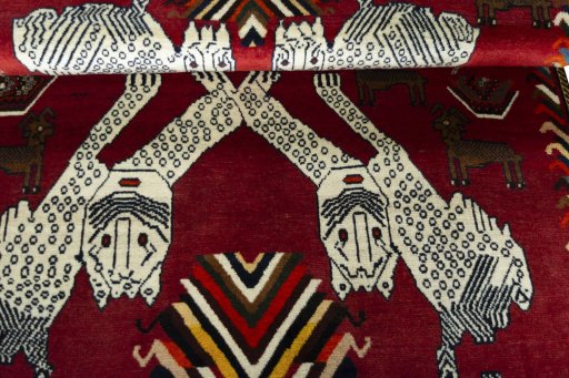 Full view of 1970s Persian Gabbeh rug from Iran / Persia, 181 × 133 cm in Red tones