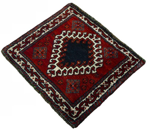 Corner detail of 2000s Persian Gabbeh rug showing border pattern and Wool pile
