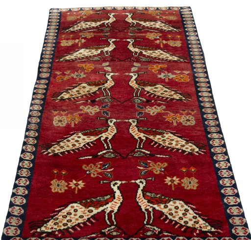 Surface texture of 2000s Persian Gabbeh rug with natural Wool and intricate pattern