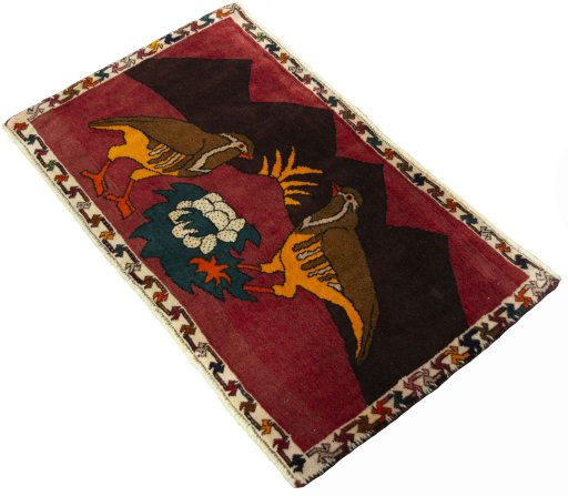 Corner detail of 2000s Persian Gabbeh rug showing border pattern and Wool pile