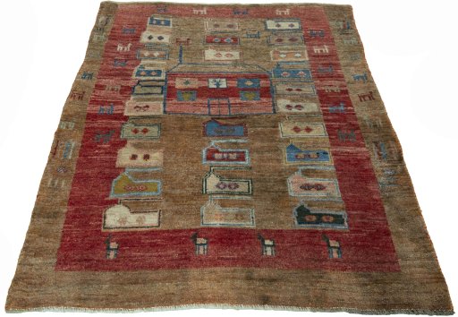 Surface texture of 2000s Persian Gabbeh rug with natural Wool and intricate pattern