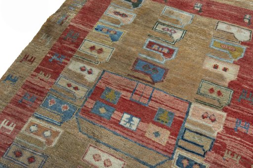 Backside of handmade 2000s Persian Gabbeh rug showing knot structure and weave density