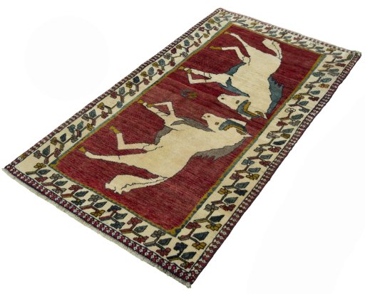 Corner detail of 2000s Persian Gabbeh rug showing border pattern and Wool pile