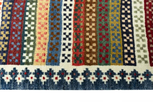 Close-up detail of 2000s Persian Gabbeh rug from Iran / Persia showing Wool weave