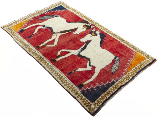 Close-up detail of 2000s Persian Gabbeh rug from Iran / Persia showing Wool weave