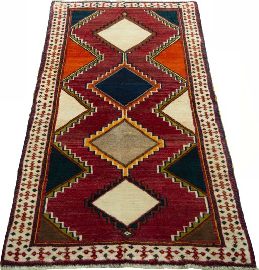 Surface texture of 2000s Persian Gabbeh rug with natural Wool and intricate pattern