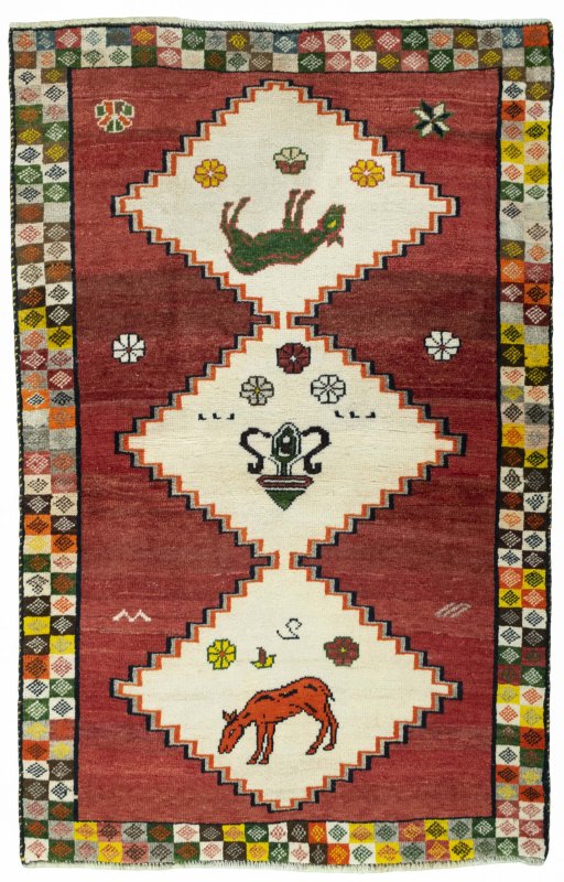 Full view of 2000s Persian Gabbeh rug from Iran / Persia, 155 × 100 cm in Red tones