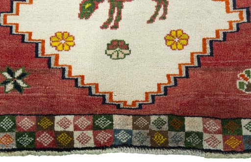 Central medallion detail of 2000s Persian Gabbeh rug from Iran / Persia