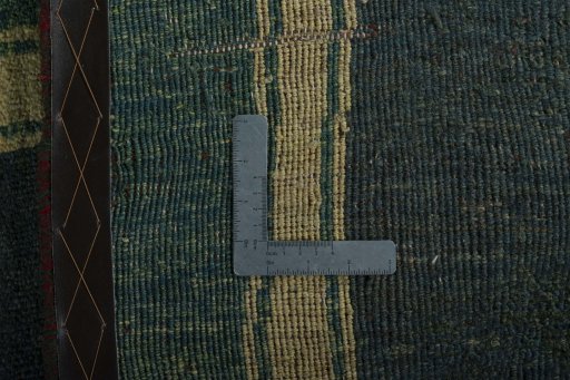 Close-up detail of 2000s Persian Gabbeh rug from Iran / Persia showing Wool weave