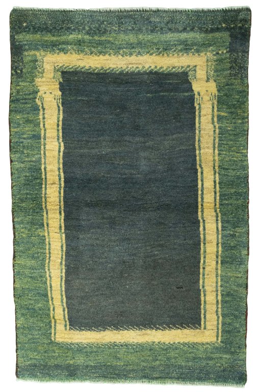 Full view of 2000s Persian Gabbeh rug from Iran / Persia, 134 × 85 cm in Green tones