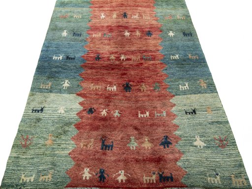 Surface texture of 1970s Persian Gabbeh rug with natural Wool and intricate pattern