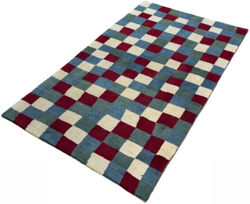 Corner detail of 2000s Persian Gabbeh rug showing border pattern and Wool pile