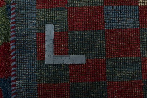 Close-up detail of 2000s Persian Gabbeh rug from Pakistan showing Wool weave
