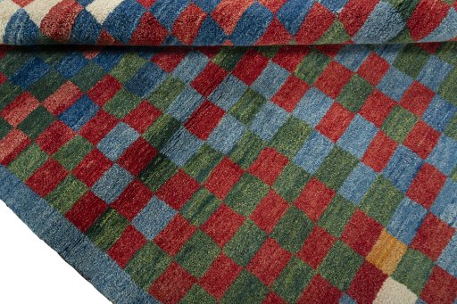 Full view of 2000s Persian Gabbeh rug from Pakistan, 215 × 153 cm in Blue tones