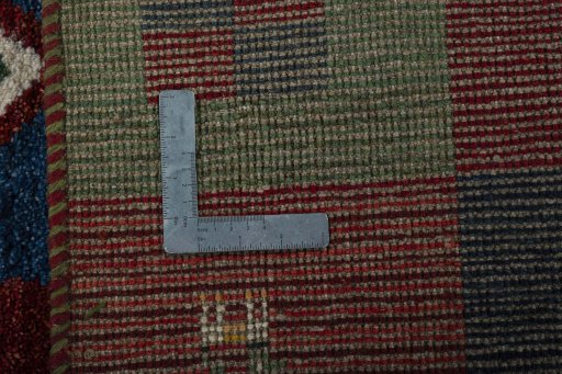 Close-up detail of 2000s Persian Gabbeh rug from Pakistan showing Wool weave