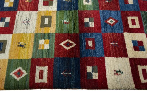 Close-up detail of 2000s Persian Gabbeh rug from Pakistan showing Wool weave