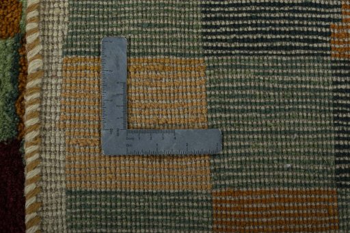 Close-up detail of 2000s Persian Gabbeh rug from Pakistan showing Wool weave