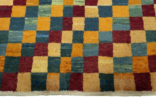 Central medallion detail of 2000s Persian Gabbeh rug from Pakistan