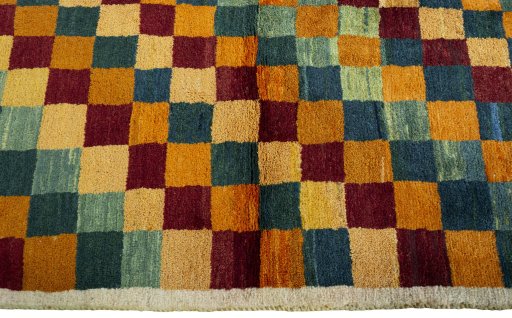 Close-up detail of 2000s Persian Gabbeh rug from Pakistan showing Wool weave