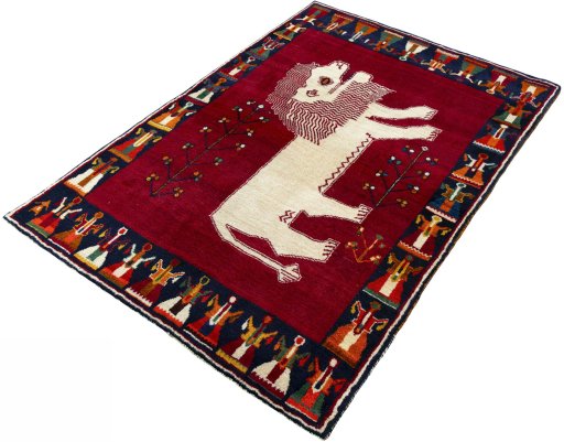 Corner detail of 2000s Persian Gabbeh rug showing border pattern and Wool pile