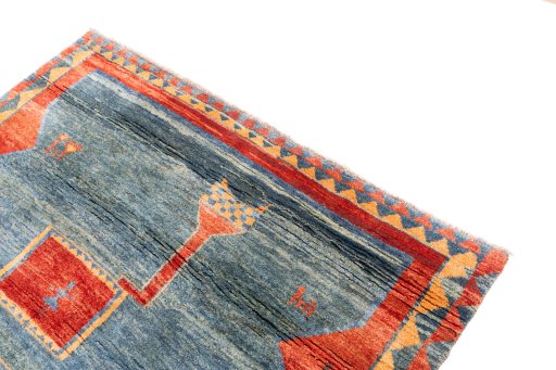 Surface texture of 1975s Persian Gabbeh rug with natural Wool and intricate pattern